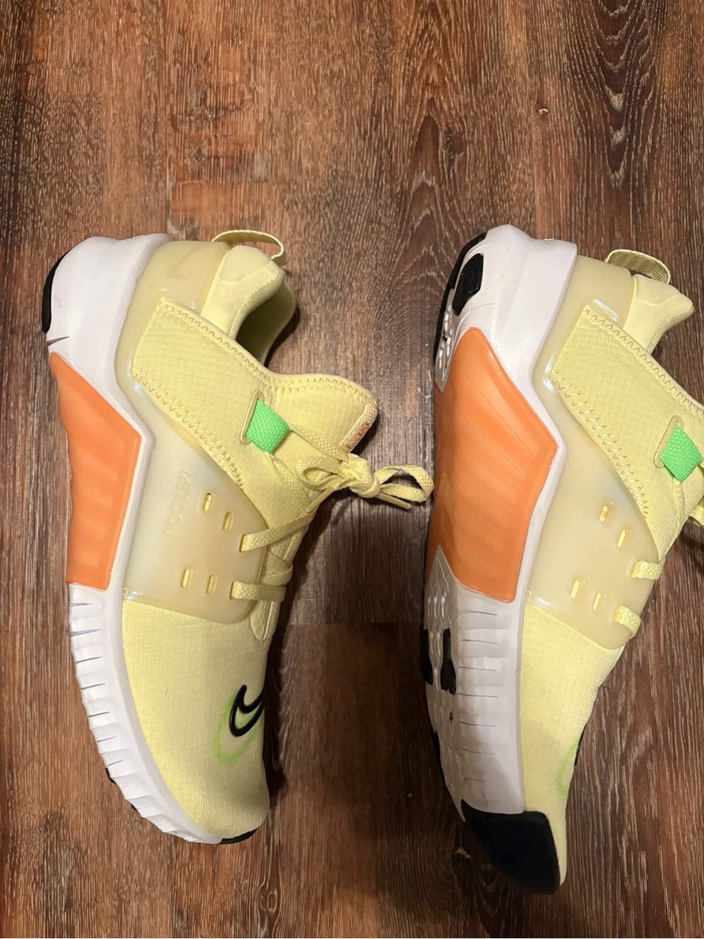 Nike women’s Yellow Sneakers with Black Swoosh and Green Accents - Picture 3 of 4